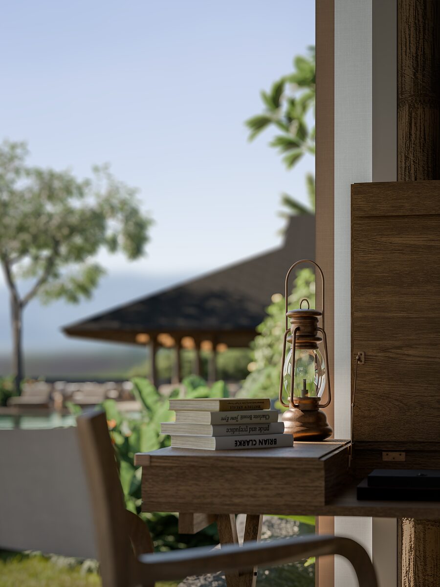 Lantern and books with the restaurant pavilion beyond
